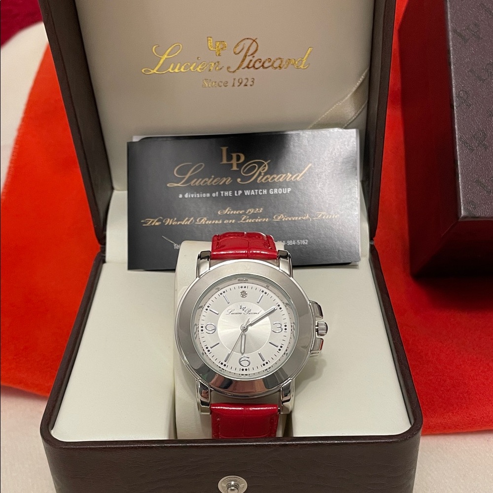 Lucien Piccard Silver Timepiece with Bold Red Band